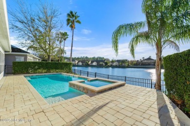 Beautifully renovated POOL w/ SPA home overlooking a serene lake on St. Johns Golf and Country Club in Florida - for sale on GolfHomes.com, golf home, golf lot