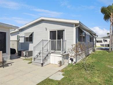 A beautifully updated 2-bedroom, 1-bathroom manufactured home in on Polo Park East in Florida - for sale on GolfHomes.com, golf home, golf lot