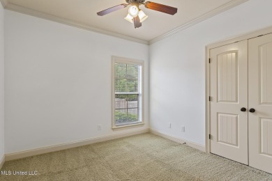 Great curb appeal on this four bedroom three bath home in Lake on Lake Caroline Golf Club in Mississippi - for sale on GolfHomes.com, golf home, golf lot