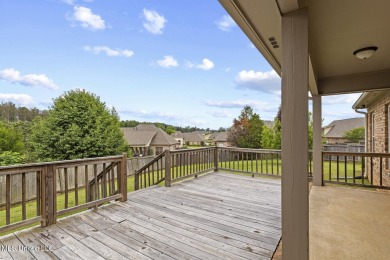 Great curb appeal on this four bedroom three bath home in Lake on Lake Caroline Golf Club in Mississippi - for sale on GolfHomes.com, golf home, golf lot