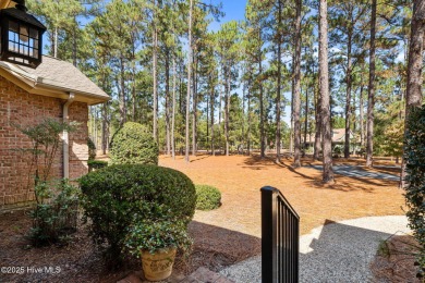 Lovely one level brick cottage on 14th hole of the Holly Course on Pinewild Country Club of Pinehurst in North Carolina - for sale on GolfHomes.com, golf home, golf lot