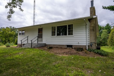 This perfectly located home sits on 15 acres close to Castle on Castle Rock Golf and Country Club in Wisconsin - for sale on GolfHomes.com, golf home, golf lot