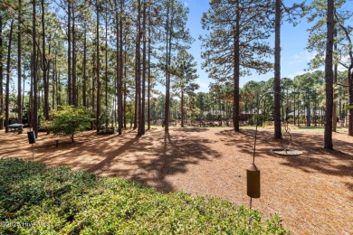 Lovely one level brick cottage on 14th hole of the Holly Course on Pinewild Country Club of Pinehurst in North Carolina - for sale on GolfHomes.com, golf home, golf lot