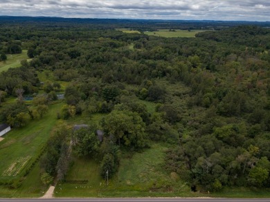 This perfectly located home sits on 15 acres close to Castle on Castle Rock Golf and Country Club in Wisconsin - for sale on GolfHomes.com, golf home, golf lot