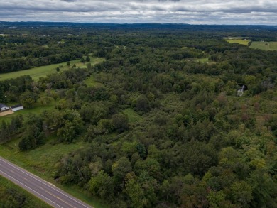 This perfectly located home sits on 15 acres close to Castle on Castle Rock Golf and Country Club in Wisconsin - for sale on GolfHomes.com, golf home, golf lot