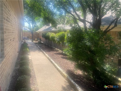 Wonderful country club location, custom built courtyard home on on Wildflower Country Club in Texas - for sale on GolfHomes.com, golf home, golf lot