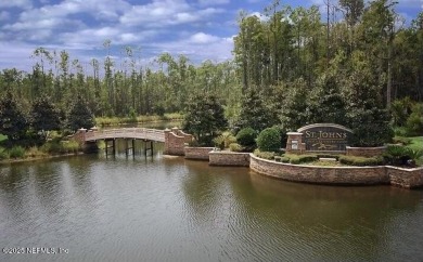 Beautifully renovated POOL w/ SPA home overlooking a serene lake on St. Johns Golf and Country Club in Florida - for sale on GolfHomes.com, golf home, golf lot