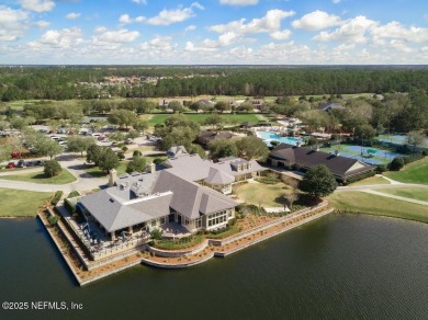 Beautifully renovated POOL w/ SPA home overlooking a serene lake on St. Johns Golf and Country Club in Florida - for sale on GolfHomes.com, golf home, golf lot