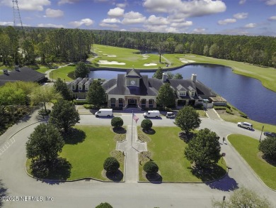 Beautifully renovated POOL w/ SPA home overlooking a serene lake on St. Johns Golf and Country Club in Florida - for sale on GolfHomes.com, golf home, golf lot