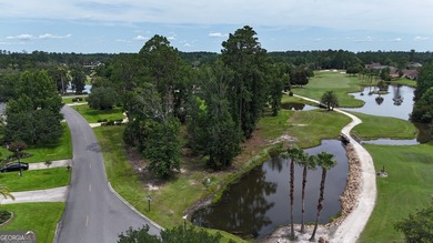 Premier Golf Course Lot with Pond Views    Discover one of the on Oak Grove Island Golf and Country Club in Georgia - for sale on GolfHomes.com, golf home, golf lot