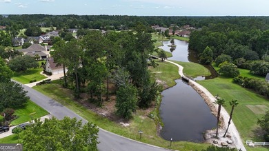 Premier Golf Course Lot with Pond Views    Discover one of the on Oak Grove Island Golf and Country Club in Georgia - for sale on GolfHomes.com, golf home, golf lot