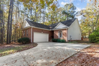 Located in a 24-hour guarded/gated community, this meticulously on Carolina Trace Country Club in North Carolina - for sale on GolfHomes.com, golf home, golf lot