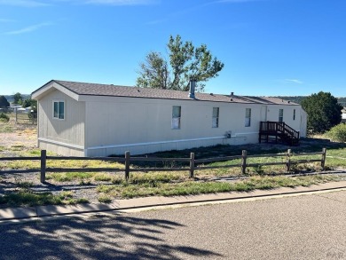 Come check out this charming 3 bed, 2 bath home in Colorado City on Hollydot Golf Course in Colorado - for sale on GolfHomes.com, golf home, golf lot