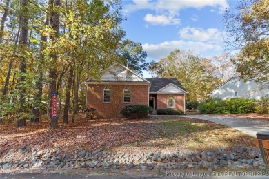 Located in a 24-hour guarded/gated community, this meticulously on Carolina Trace Country Club in North Carolina - for sale on GolfHomes.com, golf home, golf lot