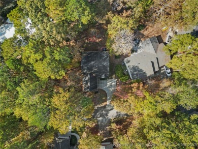 Located in a 24-hour guarded/gated community, this meticulously on Carolina Trace Country Club in North Carolina - for sale on GolfHomes.com, golf home, golf lot