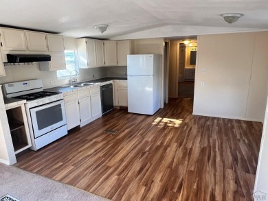 Come check out this charming 3 bed, 2 bath home in Colorado City on Hollydot Golf Course in Colorado - for sale on GolfHomes.com, golf home, golf lot