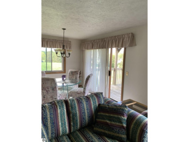 This is a great deal for a 4 bedroom, 3 bath condo just minutes on Crown Golf Course in Michigan - for sale on GolfHomes.com, golf home, golf lot