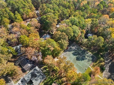 Located in a 24-hour guarded/gated community, this meticulously on Carolina Trace Country Club in North Carolina - for sale on GolfHomes.com, golf home, golf lot