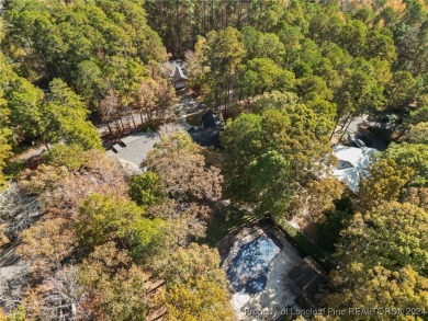 Located in a 24-hour guarded/gated community, this meticulously on Carolina Trace Country Club in North Carolina - for sale on GolfHomes.com, golf home, golf lot