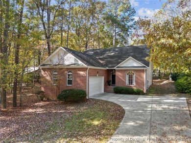 Located in a 24-hour guarded/gated community, this meticulously on Carolina Trace Country Club in North Carolina - for sale on GolfHomes.com, golf home, golf lot