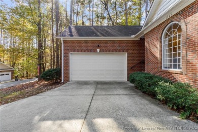 Located in a 24-hour guarded/gated community, this meticulously on Carolina Trace Country Club in North Carolina - for sale on GolfHomes.com, golf home, golf lot