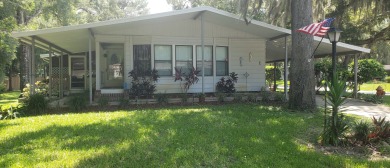 Large lovingly maintained fully furnished 2 bedroom 2 bath home on Tomoka Oaks Golf and Country Club in Florida - for sale on GolfHomes.com, golf home, golf lot