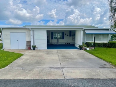This 2 Bedroom, 2 Bath split floor plan is open and light and on Water Oak Country Club Estates in Florida - for sale on GolfHomes.com, golf home, golf lot