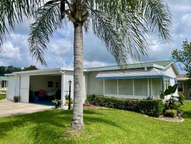 This 2 Bedroom, 2 Bath split floor plan is open and light and on Water Oak Country Club Estates in Florida - for sale on GolfHomes.com, golf home, golf lot