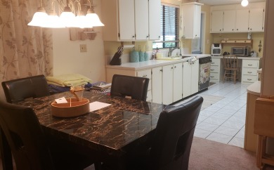 Large lovingly maintained fully furnished 2 bedroom 2 bath home on Tomoka Oaks Golf and Country Club in Florida - for sale on GolfHomes.com, golf home, golf lot