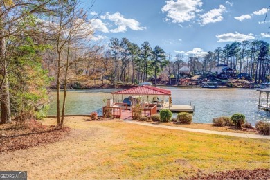 NEW PRICE. Discover your secluded retreat on the shores of on Turtle Cove Golf Course in Georgia - for sale on GolfHomes.com, golf home, golf lot