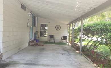 Large lovingly maintained fully furnished 2 bedroom 2 bath home on Tomoka Oaks Golf and Country Club in Florida - for sale on GolfHomes.com, golf home, golf lot