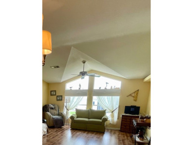 This 2 Bedroom, 2 Bath split floor plan is open and light and on Water Oak Country Club Estates in Florida - for sale on GolfHomes.com, golf home, golf lot