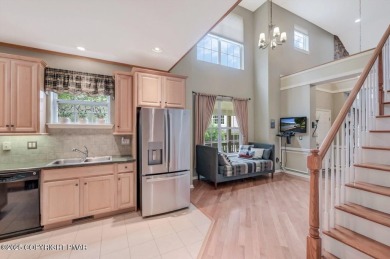An attractive townhome designed with end unit appeal on Pinecrest Lake Golf and Country Club in Pennsylvania - for sale on GolfHomes.com, golf home, golf lot
