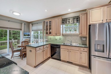 An attractive townhome designed with end unit appeal on Pinecrest Lake Golf and Country Club in Pennsylvania - for sale on GolfHomes.com, golf home, golf lot