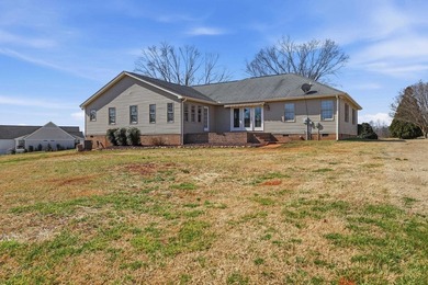 Experience refined living in this impeccable custom home nestled on Falcons Lair Golf Club in South Carolina - for sale on GolfHomes.com, golf home, golf lot