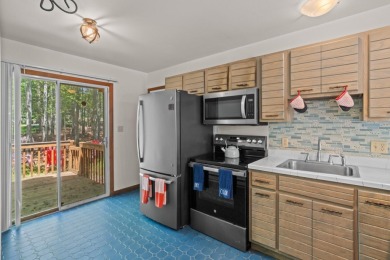Step into this bright and beautifully styled 3-bedroom, 2-bath on Pocono Farms Country Club in Pennsylvania - for sale on GolfHomes.com, golf home, golf lot