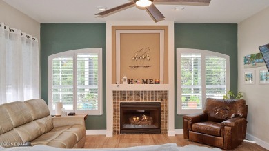 This stunning 4-bedroom saltwater pool home offers both elegance on Plantation Bay Golf and Country Club in Florida - for sale on GolfHomes.com, golf home, golf lot
