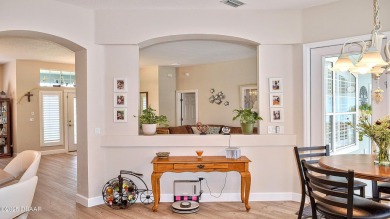 This stunning 4-bedroom saltwater pool home offers both elegance on Plantation Bay Golf and Country Club in Florida - for sale on GolfHomes.com, golf home, golf lot
