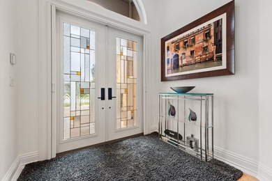 Beautiful single-story home on desirable Via Paradisio in on Country Club At Mirasol in Florida - for sale on GolfHomes.com, golf home, golf lot