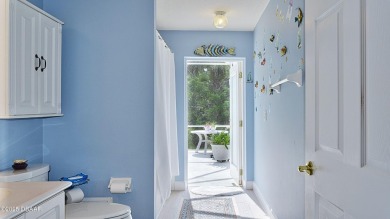 This stunning 4-bedroom saltwater pool home offers both elegance on Plantation Bay Golf and Country Club in Florida - for sale on GolfHomes.com, golf home, golf lot