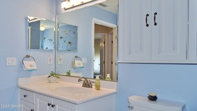 This stunning 4-bedroom saltwater pool home offers both elegance on Plantation Bay Golf and Country Club in Florida - for sale on GolfHomes.com, golf home, golf lot