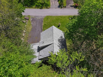 Step into this bright and beautifully styled 3-bedroom, 2-bath on Pocono Farms Country Club in Pennsylvania - for sale on GolfHomes.com, golf home, golf lot