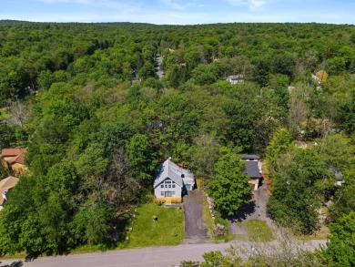 Step into this bright and beautifully styled 3-bedroom, 2-bath on Pocono Farms Country Club in Pennsylvania - for sale on GolfHomes.com, golf home, golf lot