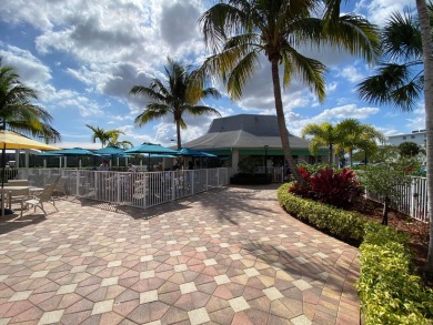 Nestled within the prestigious Century Village East, this rare on Hillsboro Pines Golf in Florida - for sale on GolfHomes.com, golf home, golf lot