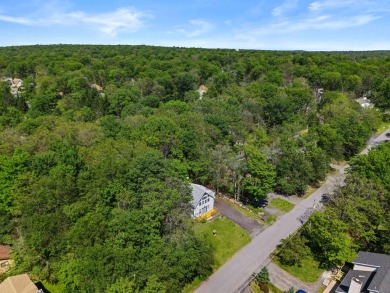 Step into this bright and beautifully styled 3-bedroom, 2-bath on Pocono Farms Country Club in Pennsylvania - for sale on GolfHomes.com, golf home, golf lot