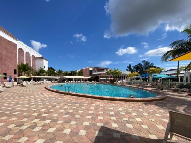 Nestled within the prestigious Century Village East, this rare on Hillsboro Pines Golf in Florida - for sale on GolfHomes.com, golf home, golf lot