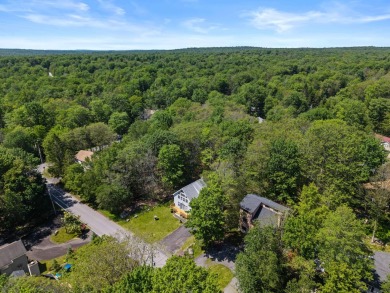 Step into this bright and beautifully styled 3-bedroom, 2-bath on Pocono Farms Country Club in Pennsylvania - for sale on GolfHomes.com, golf home, golf lot