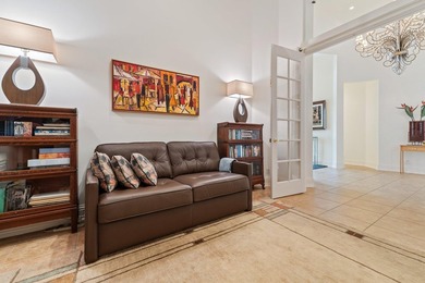 Beautiful single-story home on desirable Via Paradisio in on Country Club At Mirasol in Florida - for sale on GolfHomes.com, golf home, golf lot