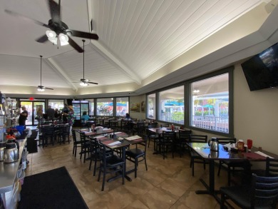 Nestled within the prestigious Century Village East, this rare on Hillsboro Pines Golf in Florida - for sale on GolfHomes.com, golf home, golf lot