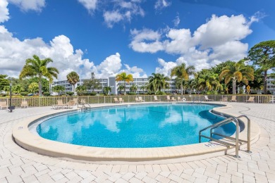 Nestled within the prestigious Century Village East, this rare on Hillsboro Pines Golf in Florida - for sale on GolfHomes.com, golf home, golf lot